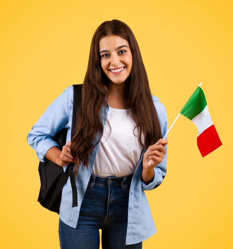 Smiling european teenager student pupil, with Italian flag, enjoy exchange study, courses